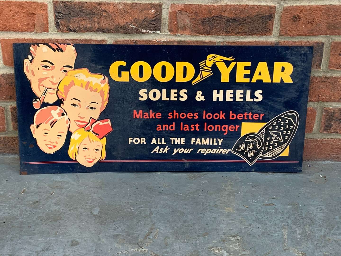 <p>Goodyear Soles and Heels Sign</p>