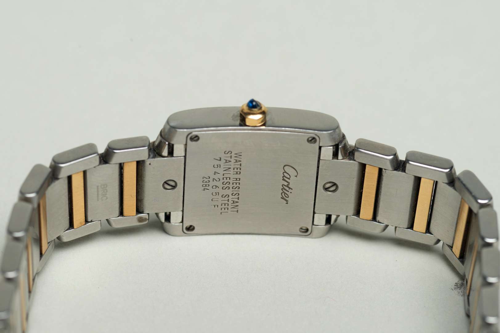 <p>CARTIER, ladies TANK FRANCAISE, steel and gold quartz wristwatch. Ref 2384,</p>