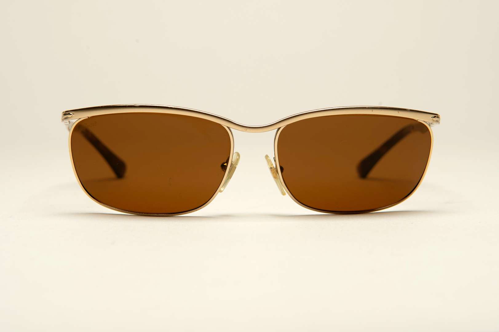 <p>PERSOL, a pair of Italian gilt framed sunglasses</p>