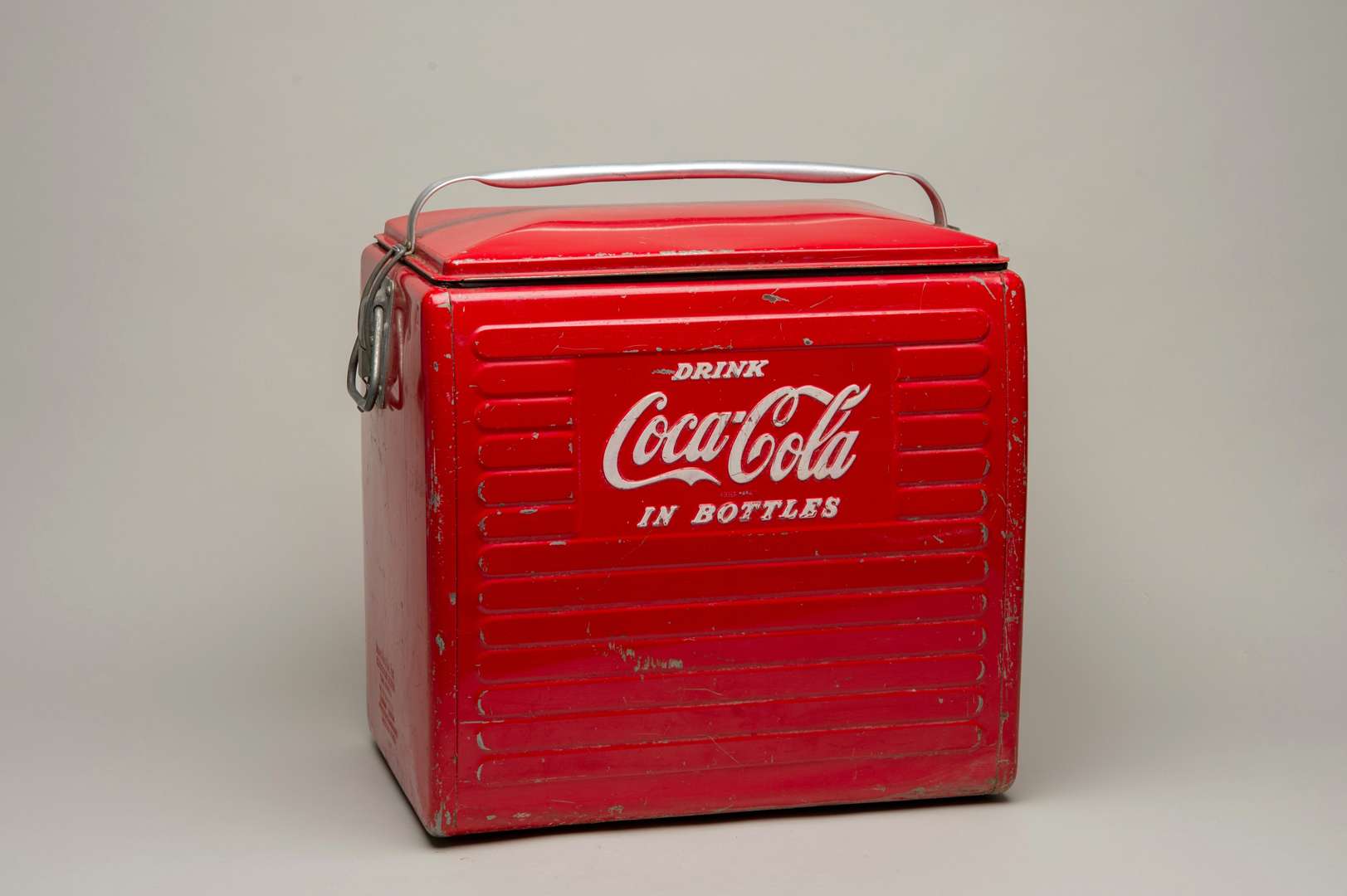 <p>COCA-COLA. a mid 20th century, steel and aluminium, portable cool box</p>