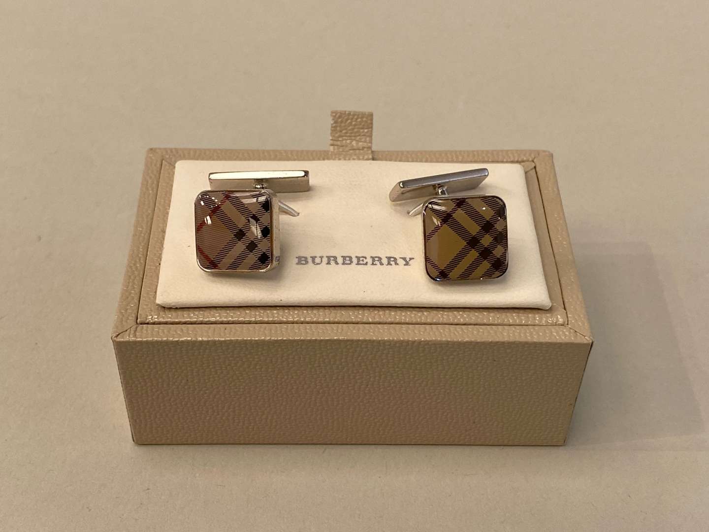 <p>BURBERRY, men's Ostrich, kidskin & cashmere lined gloves, together with a pair of Burberry cufflinks</p>