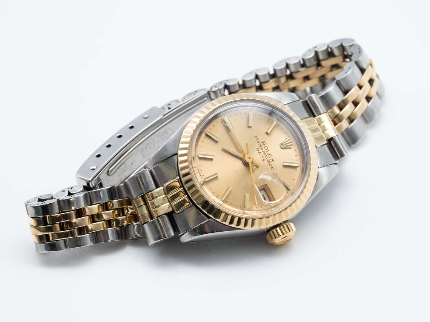 <p>ROLEX, Date, 6917, a late 20th century stainless steel and gold, calendar wristwatch.</p>
