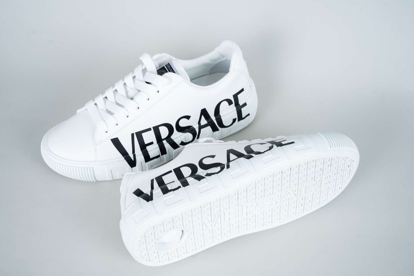 <p>VERSACE, a pair of Greca trainers</p>