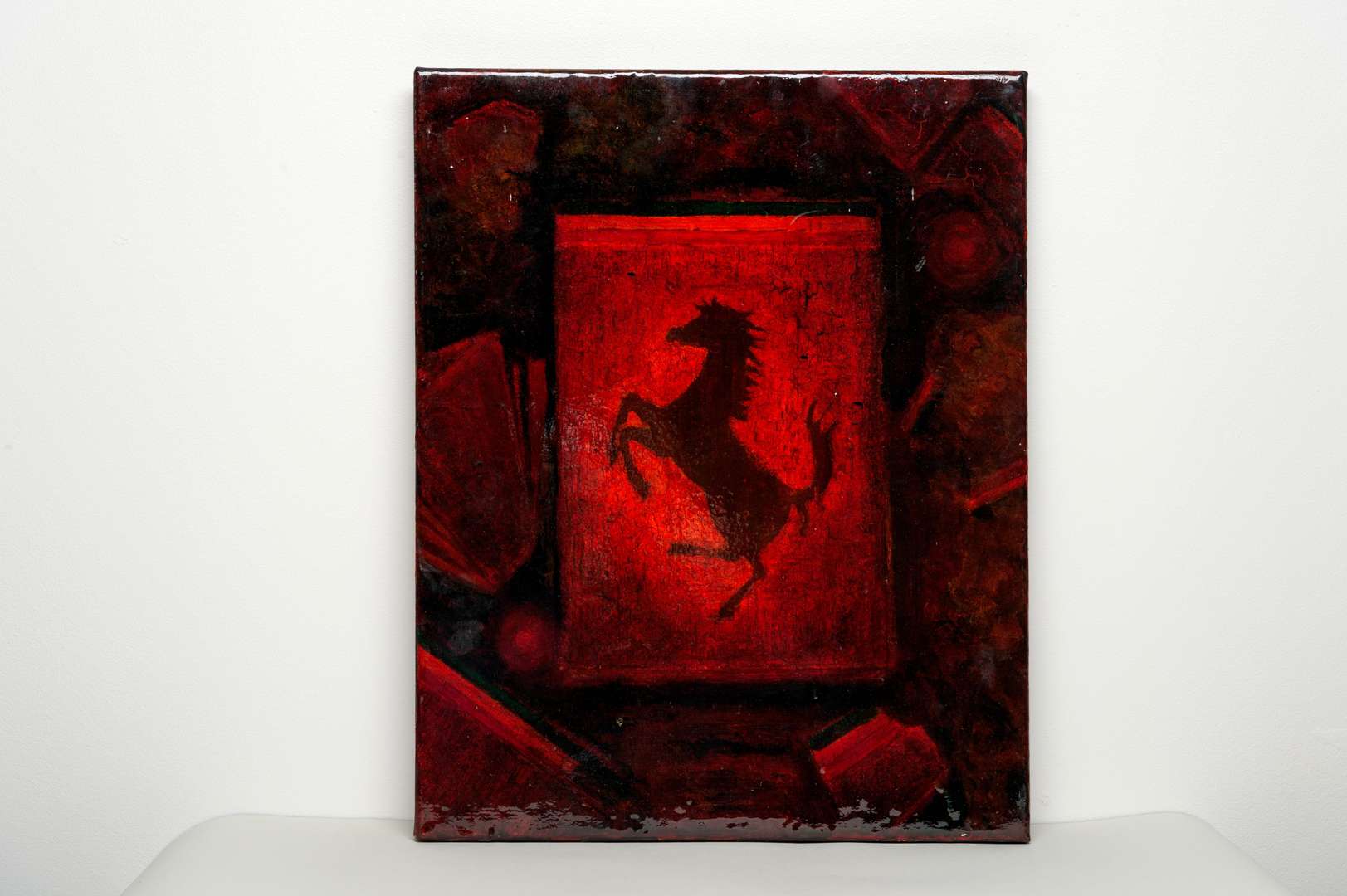 <p>CHRIS REA, ‘Cavallino Rampante on Shield’, mixed media, 51 cm x 40.5 cm</p>