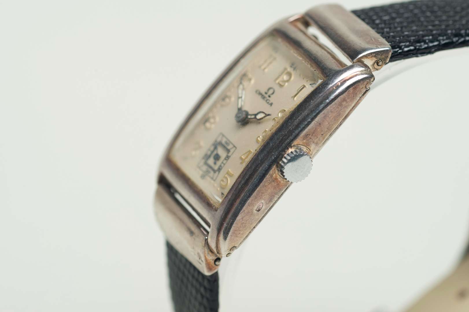 <p>OMEGA. a first half of the 20th century, rectangular silver cased wristwatch,</p>