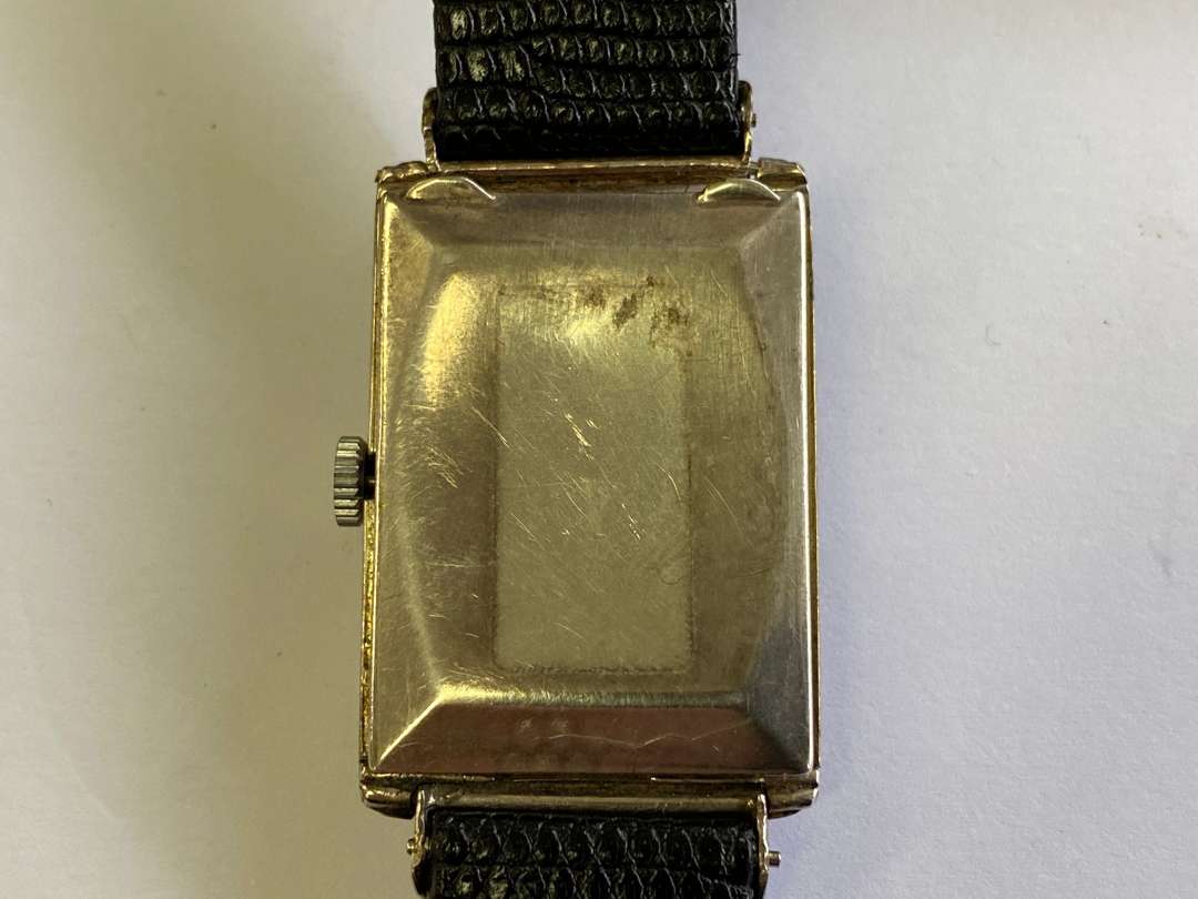 <p>OMEGA. a first half of the 20th century, rectangular silver cased wristwatch,</p>