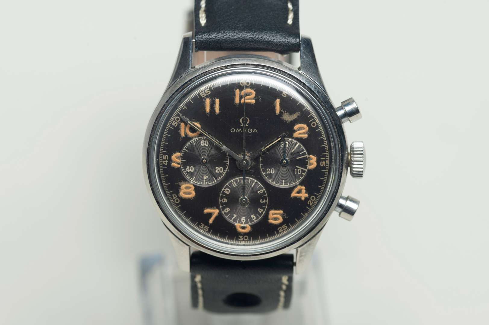 <p>OMEGA. a mid 20th century stainless steel, two button chronograph wristwatch.</p>