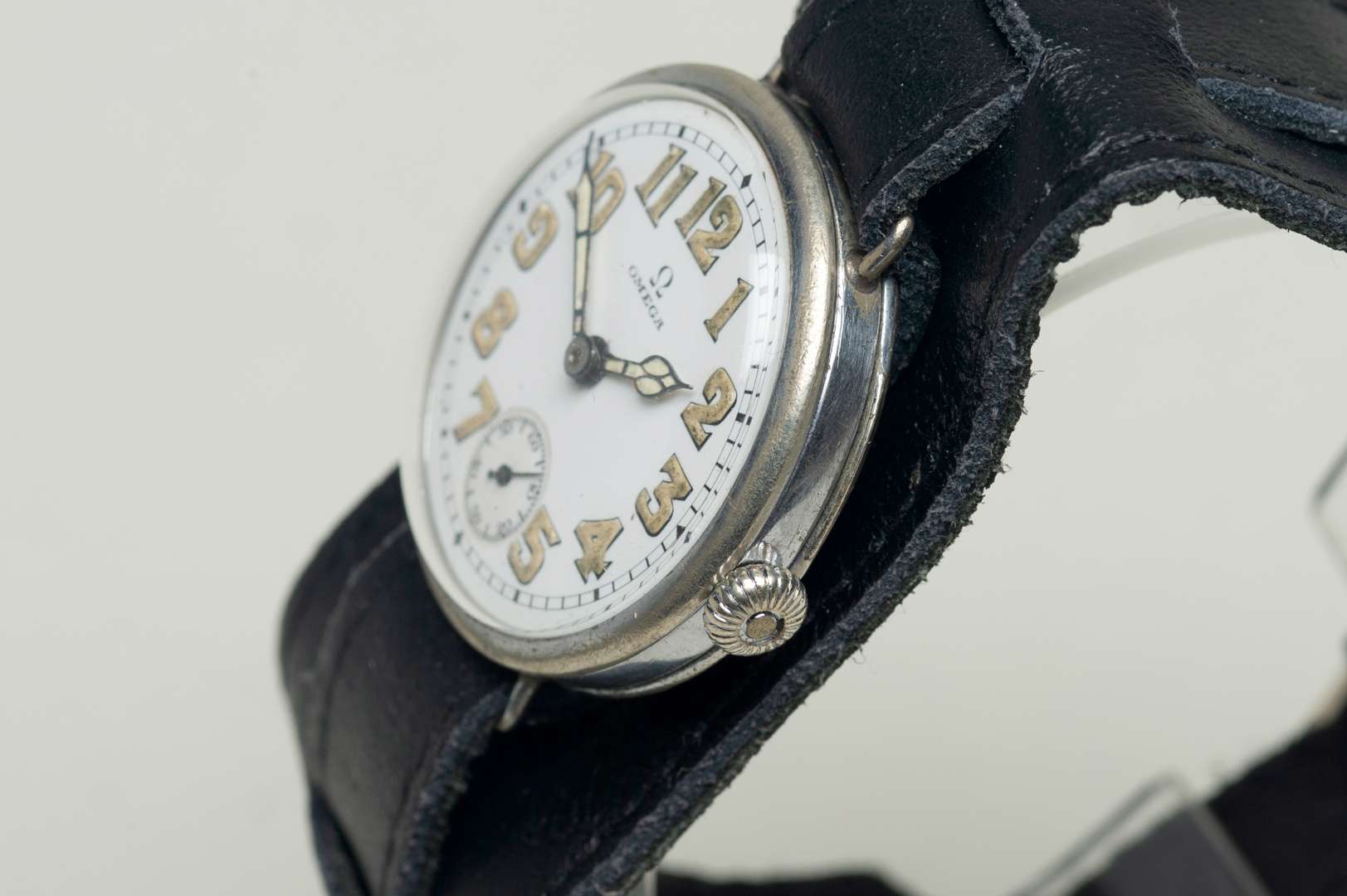 <p>OMEGA. an early 20th century base metal cased wristwatch.</p>