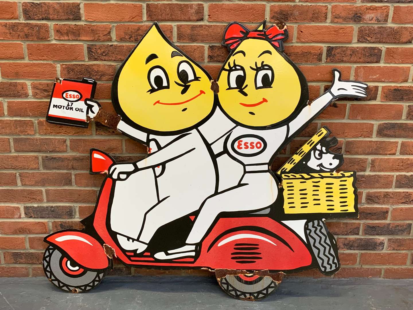<p>Large Enamel Mr And Mrs Drip On A Scooter Sign</p>