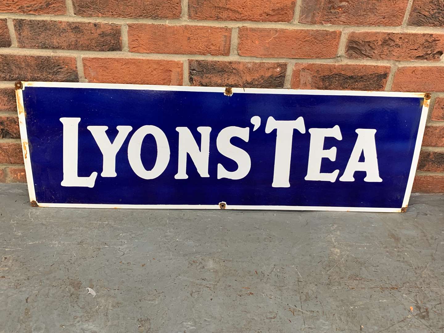 <p>Enamel Lyons Tea Sign</p>