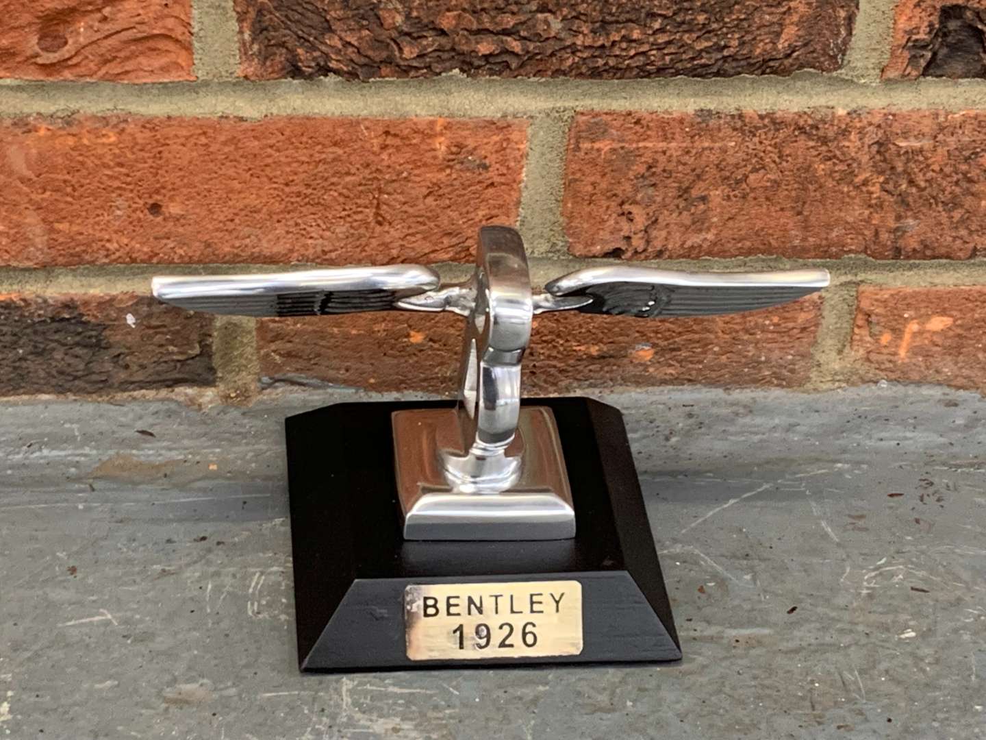 <p>Cast Aluminium Bentley Flying B on Plinth</p>