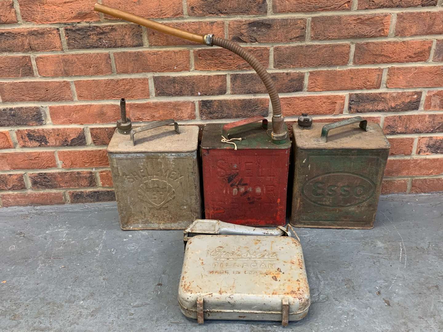 <p>Four Vintage Fuel Cans</p>