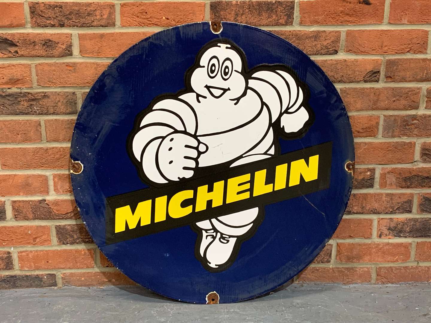 <p>Enamel Circular Michelin Running Man Sign</p>