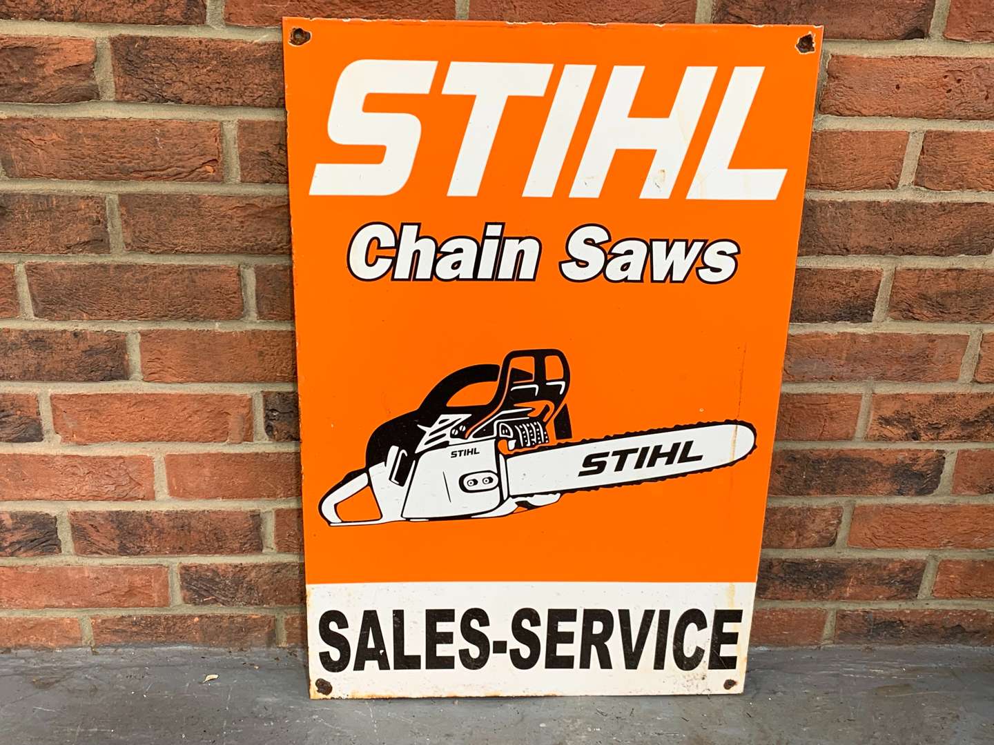 <p>Enamel Stihl Chain Saws Sign</p>