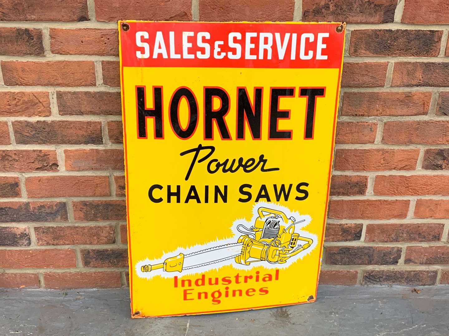 <p>Enamel Hornet Power Chain Saws Sign</p>