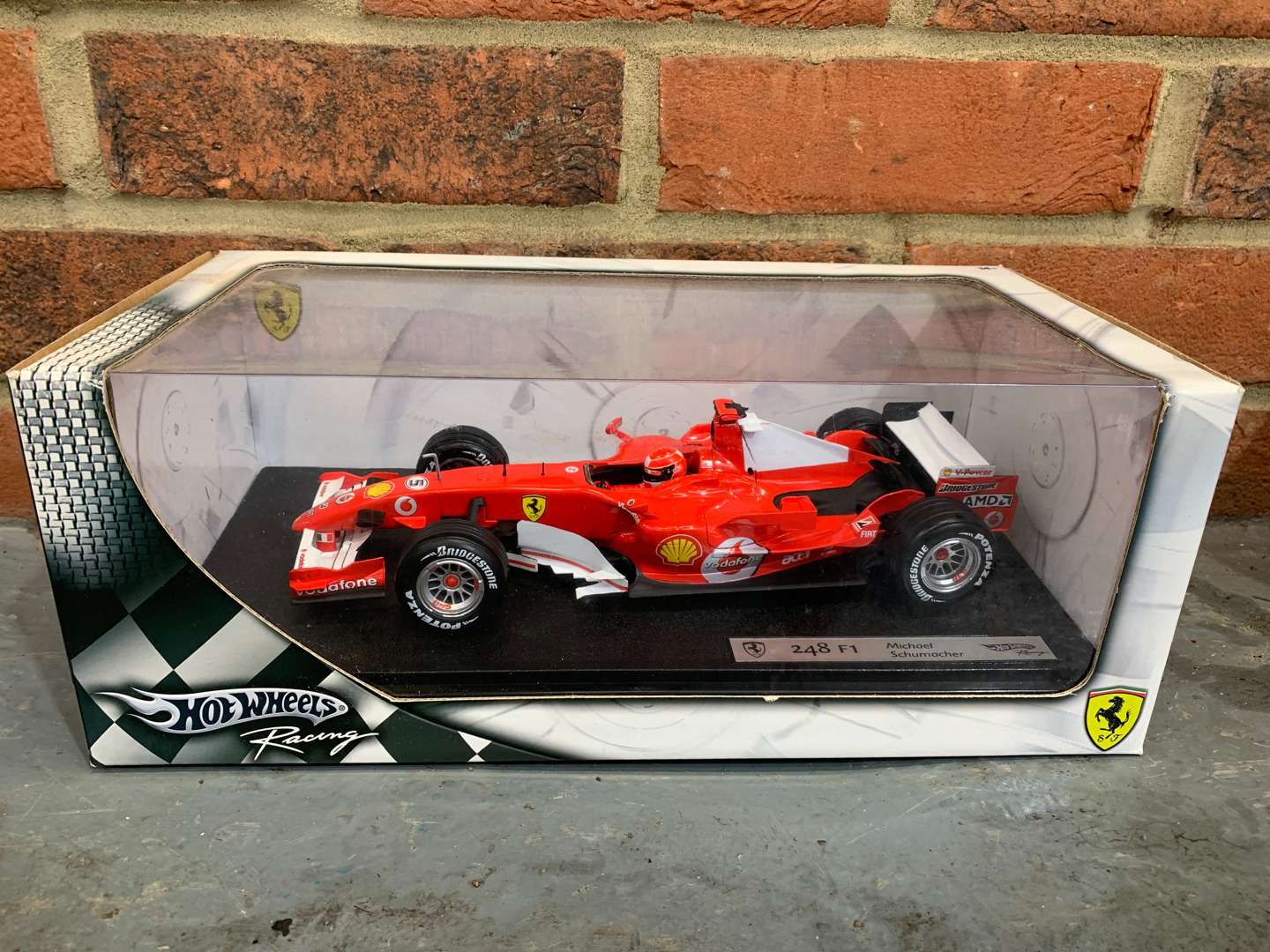 <p>Boxed Hotwheels Ferrari 248 F1 Michael Schumacher Car</p>