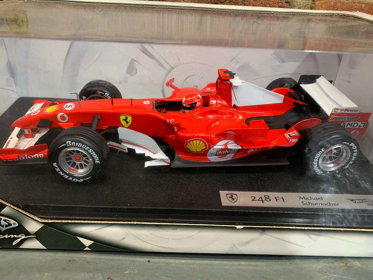 <p>Boxed Hotwheels Ferrari 248 F1 Michael Schumacher Car</p>