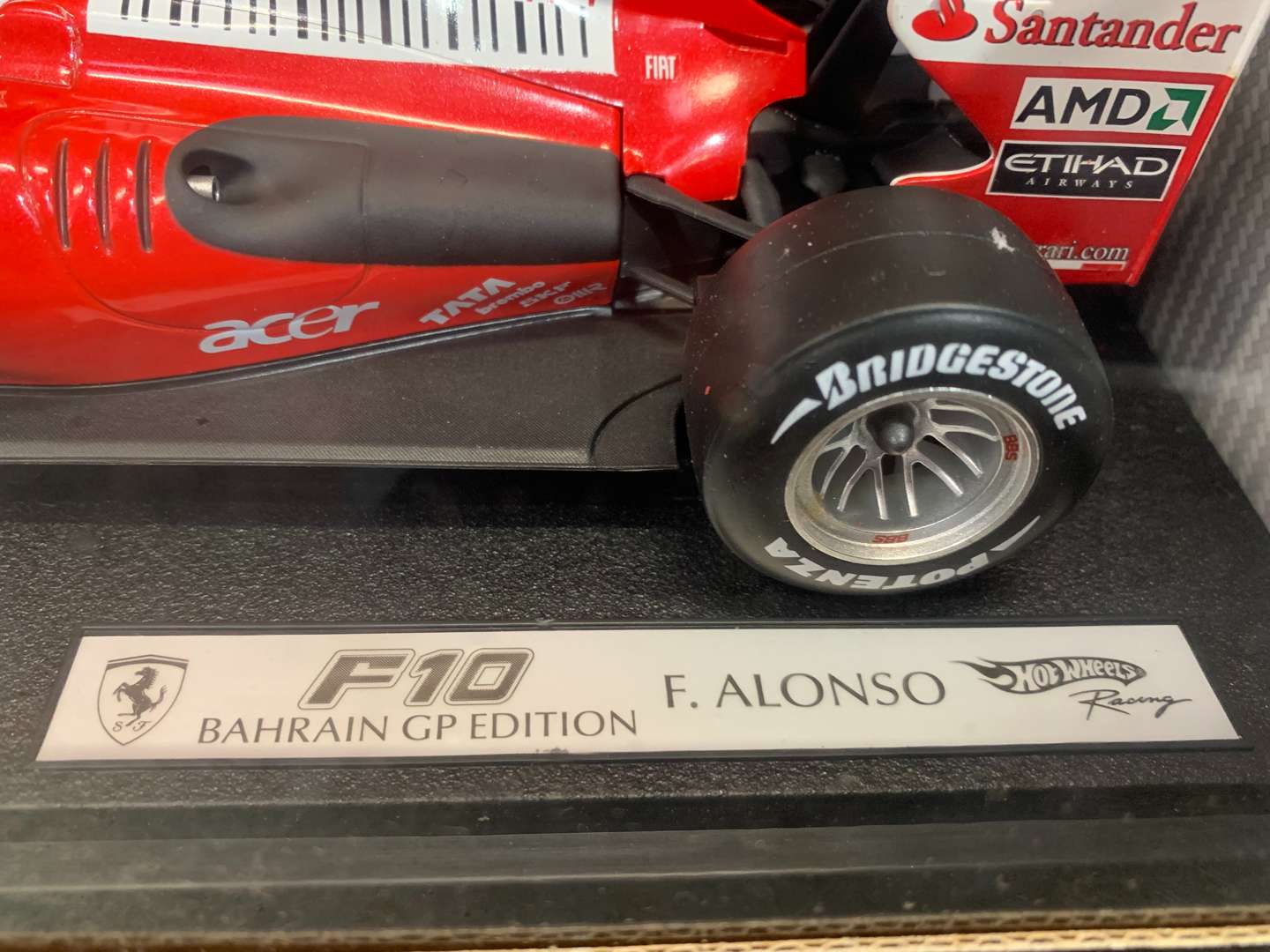 <p>Boxed Hotwheels Ferrari F10 F. Alonso Car</p>