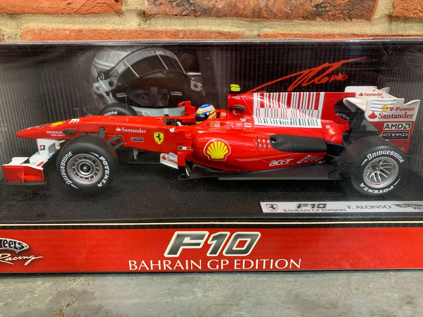 <p>Boxed Hotwheels Ferrari F10 F. Alonso Car</p>
