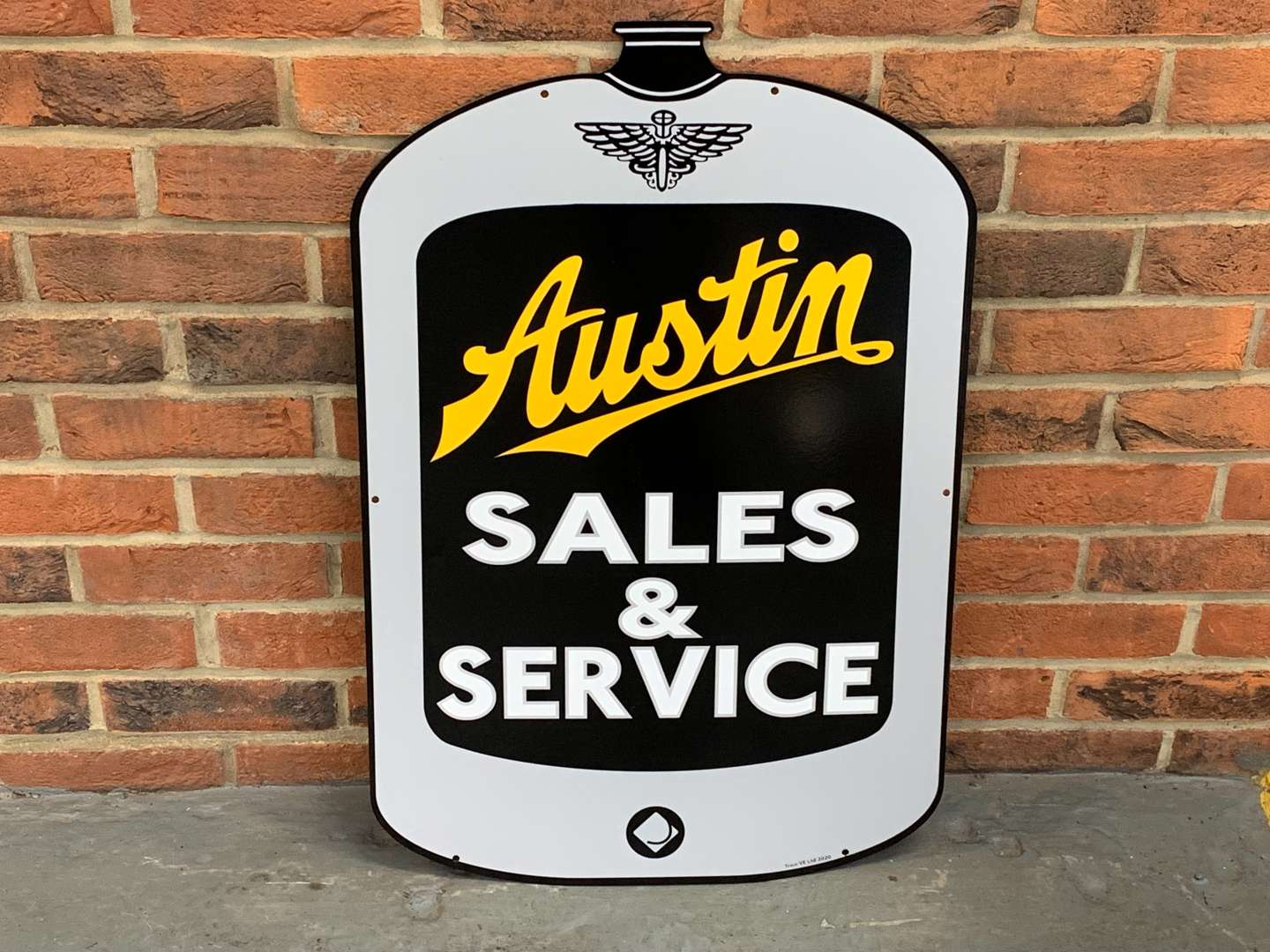 <p>Enamel Austin Sales and Service Sign</p>