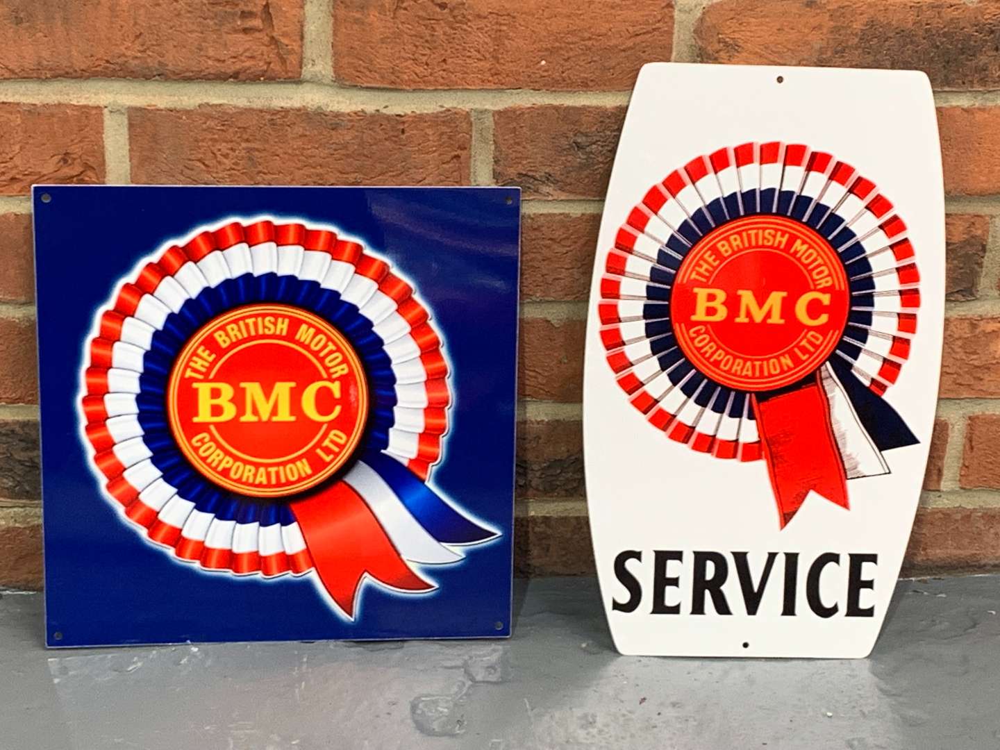 <p>Two Metal BMC Signs</p>