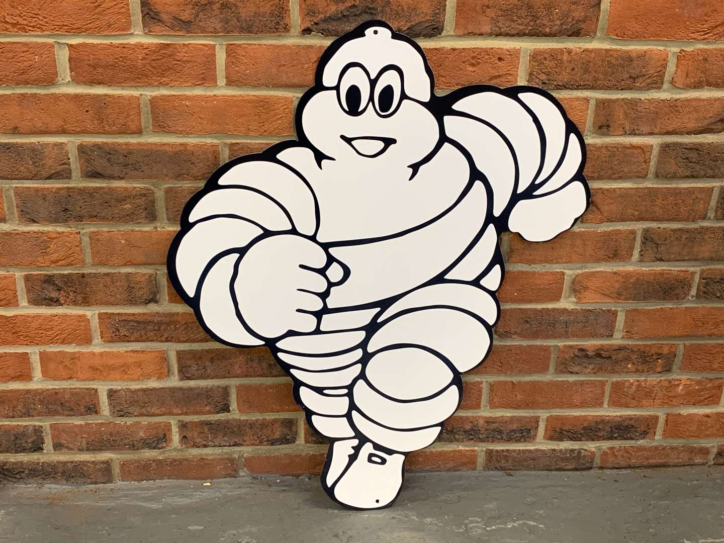 <p>Large Metal Michelin Running Man Sign</p>