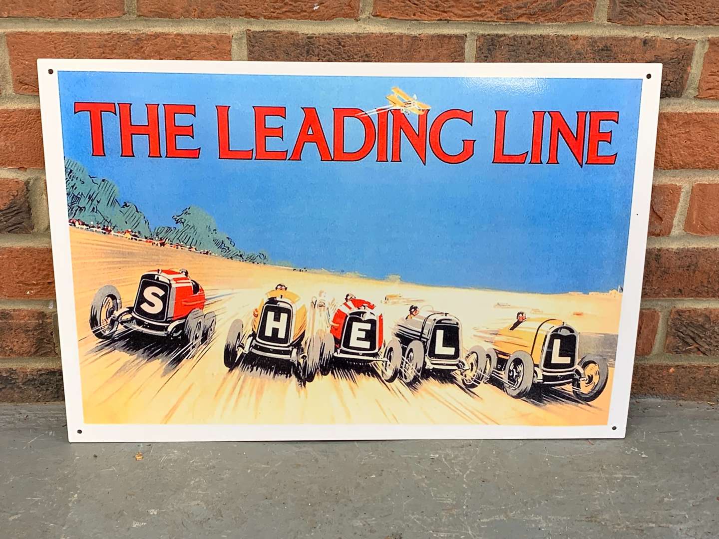 <p>Metal Shell “The Leading Line” Sign</p>