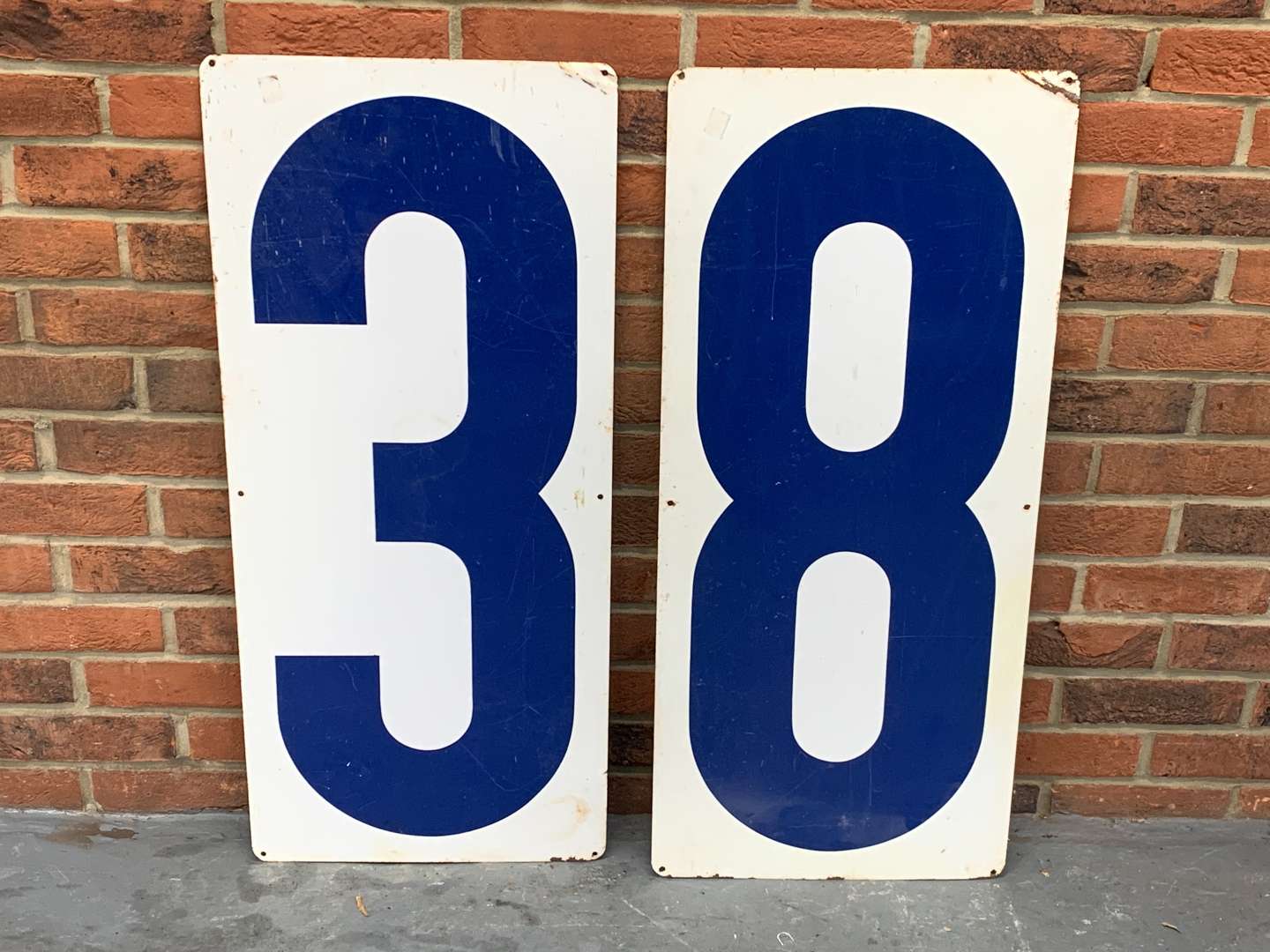 <p>Two American 1950's Gas Station Numbers</p>