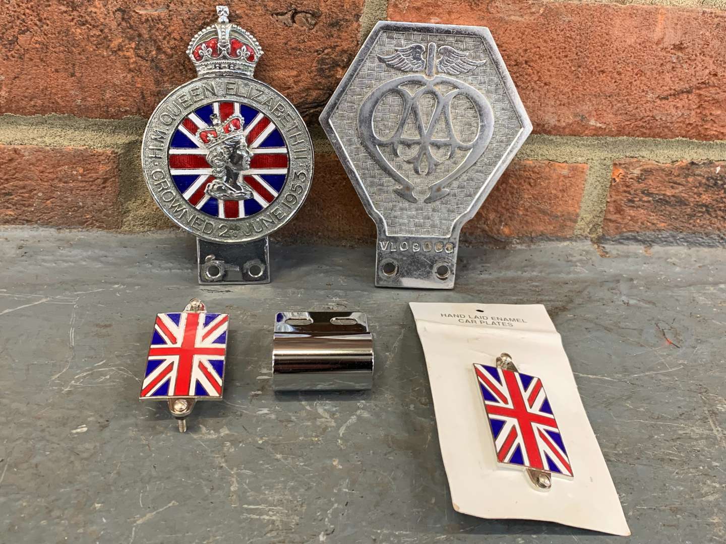 <p>AA Badge, Queen Elizabeth Coronation Badge and Two Union Jack Badges (4)</p>