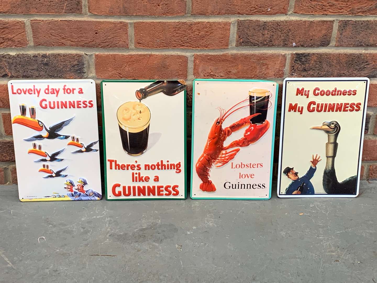 <p>Four Modern Tin Guinness Advertising Signs</p>