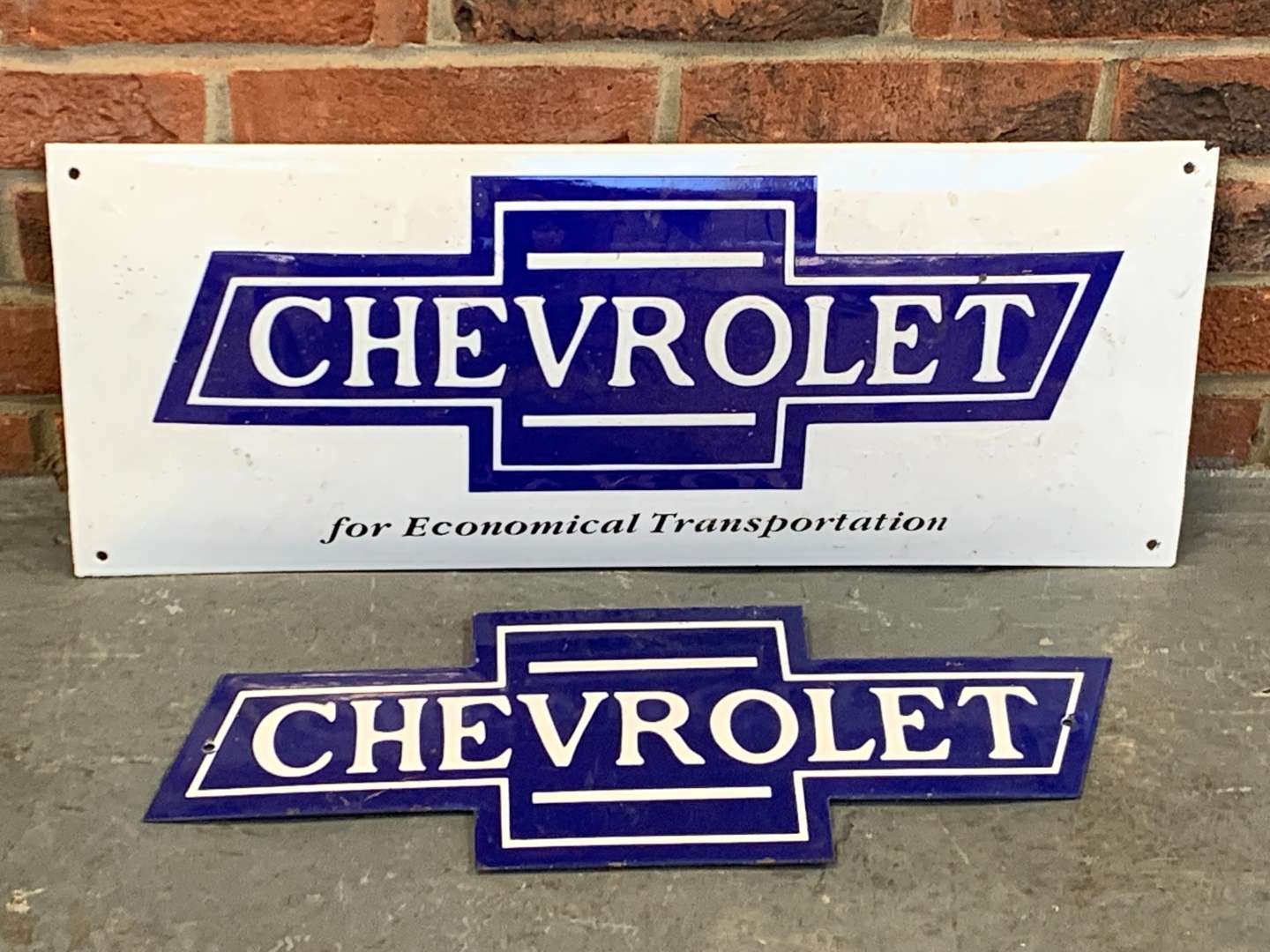 <p>Two Enamel Chevrolet Signs</p>