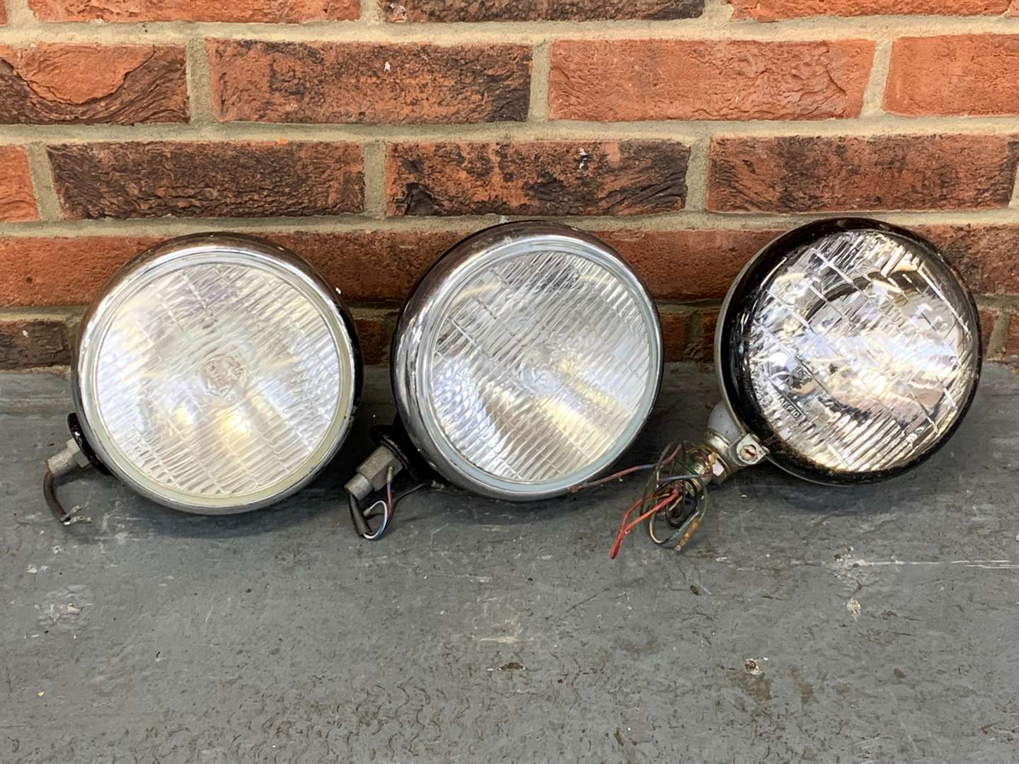 <p>Three Classic Car Spot Lamps</p>