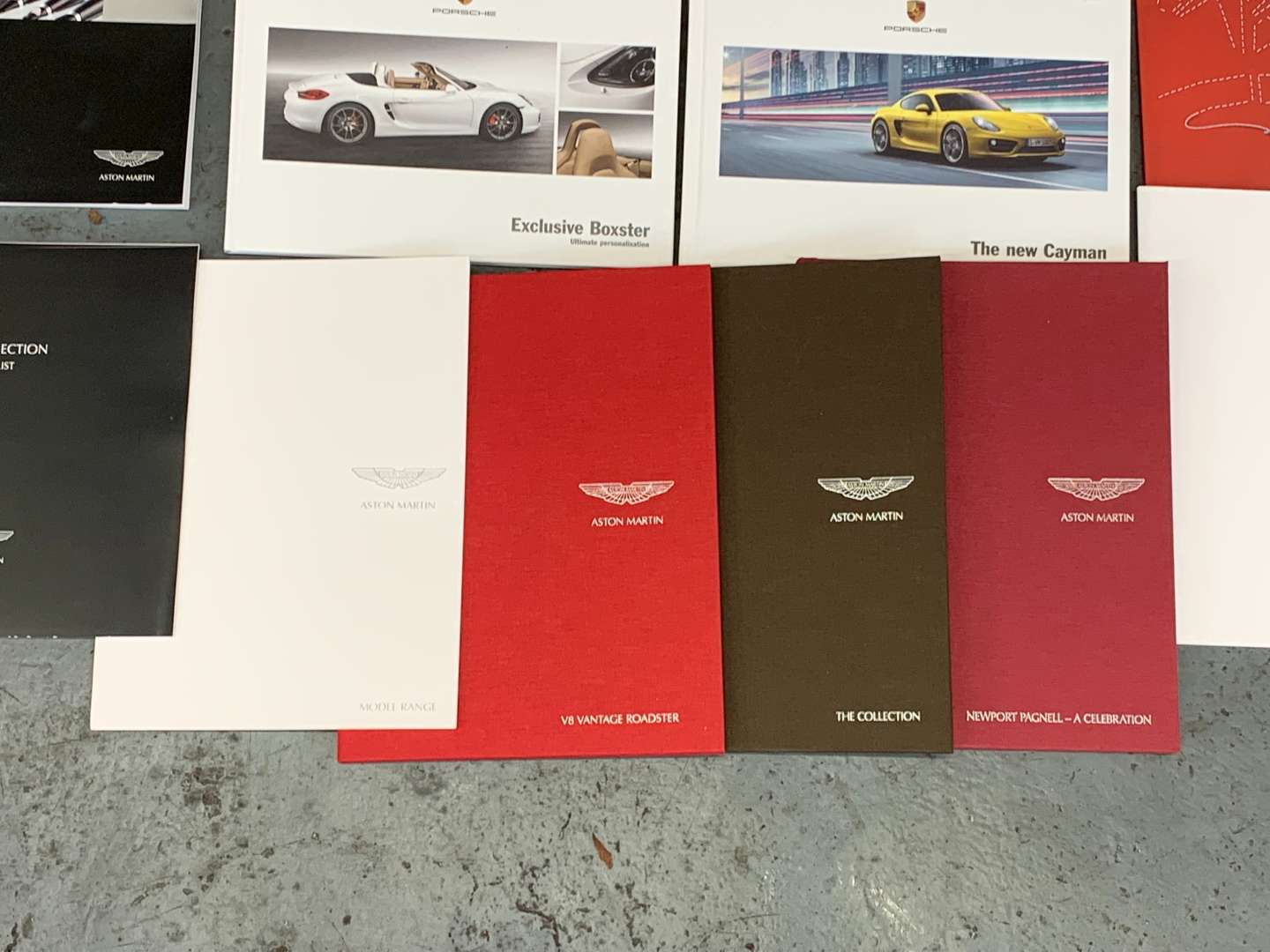 <p>Mixed Lot of Aston Martin and Porsche Books, Brochures&nbsp;</p>