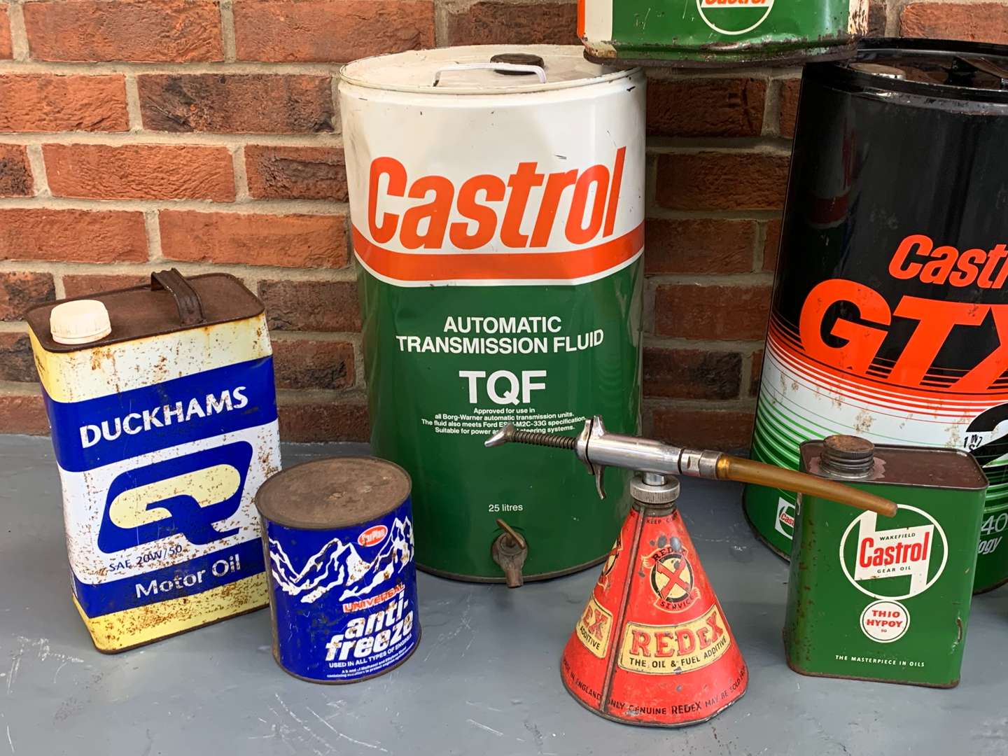 <p>Eight Vintage Oil/Grease Cans, Castrol, Redex Etc</p>
