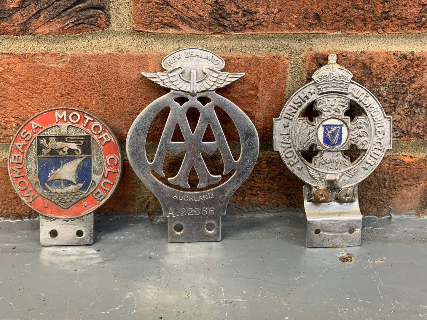 <p>Three International Classic Car Badges</p>