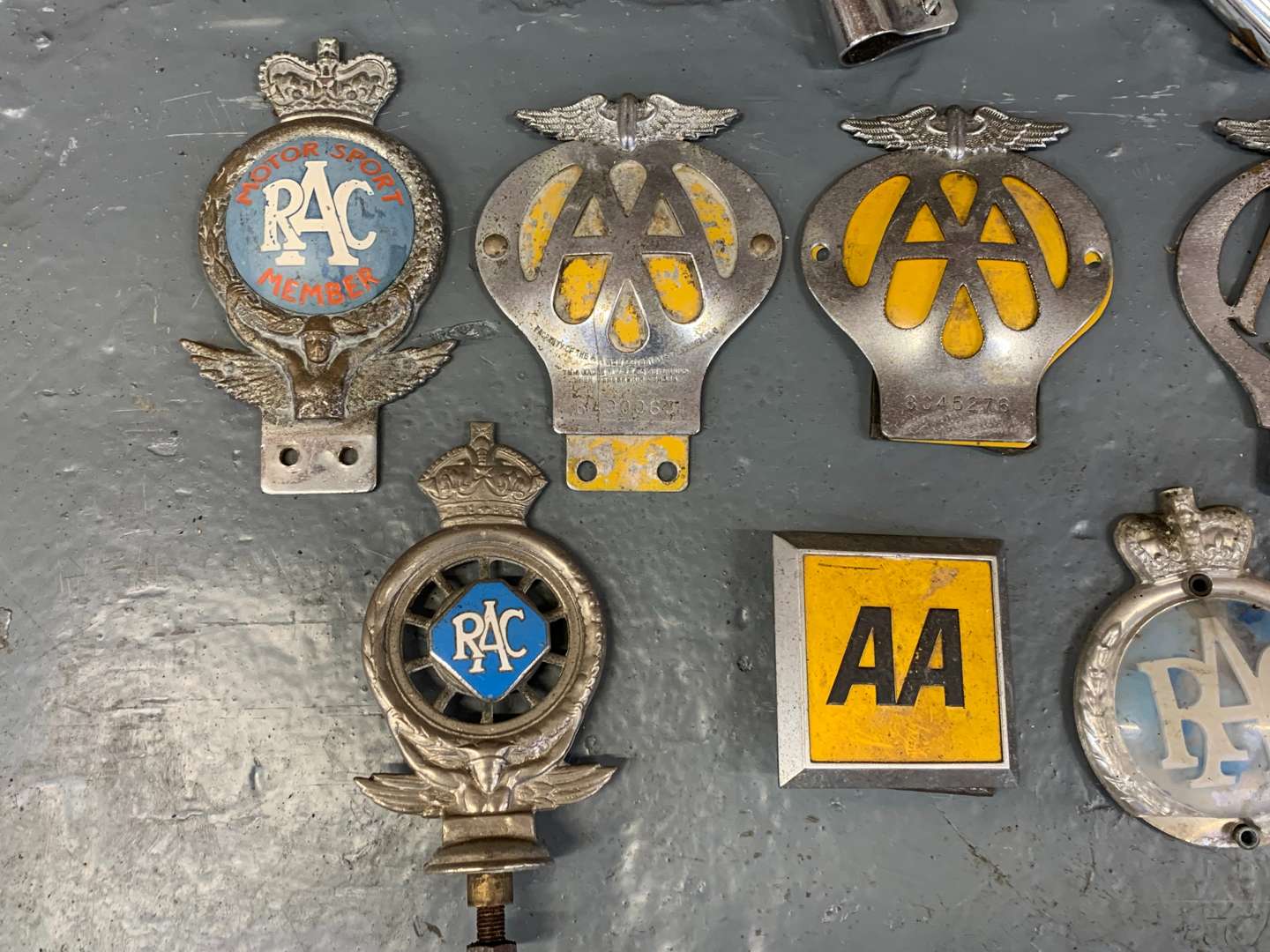 <p>Eight Classic Car Badges and Bar</p>
