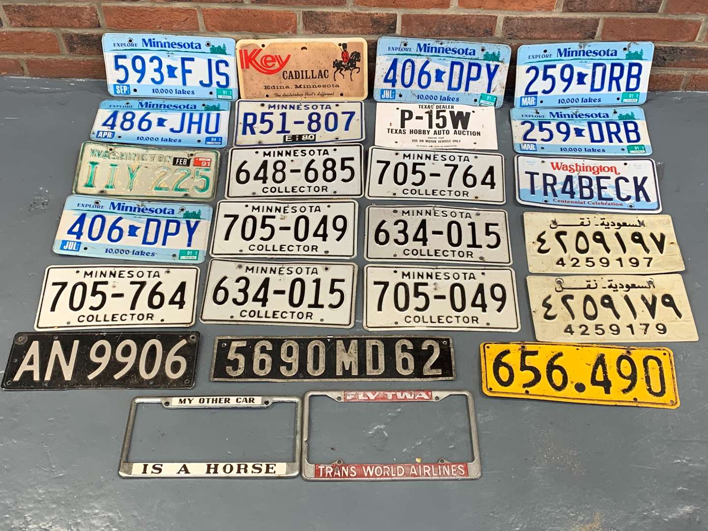 <p>Twenty Three American and Other Number Plates</p>