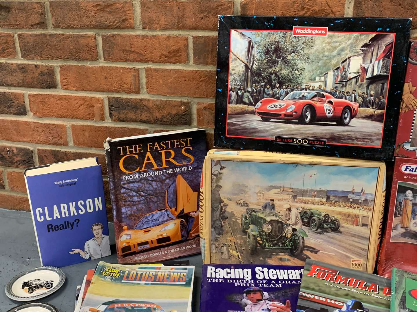 <p>Mixed of Motoring Books, Posters, Plates, Jigsaws Etc</p>