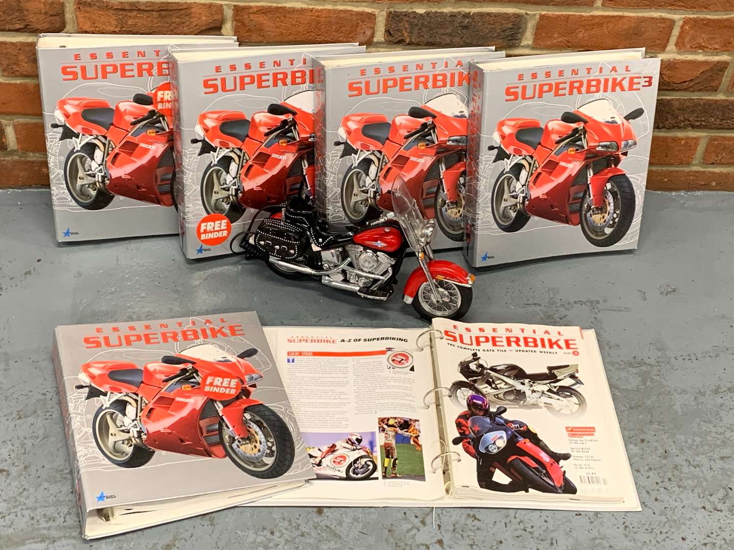 <p>Superbikes Magazines and Harley Davidson Telephone</p>