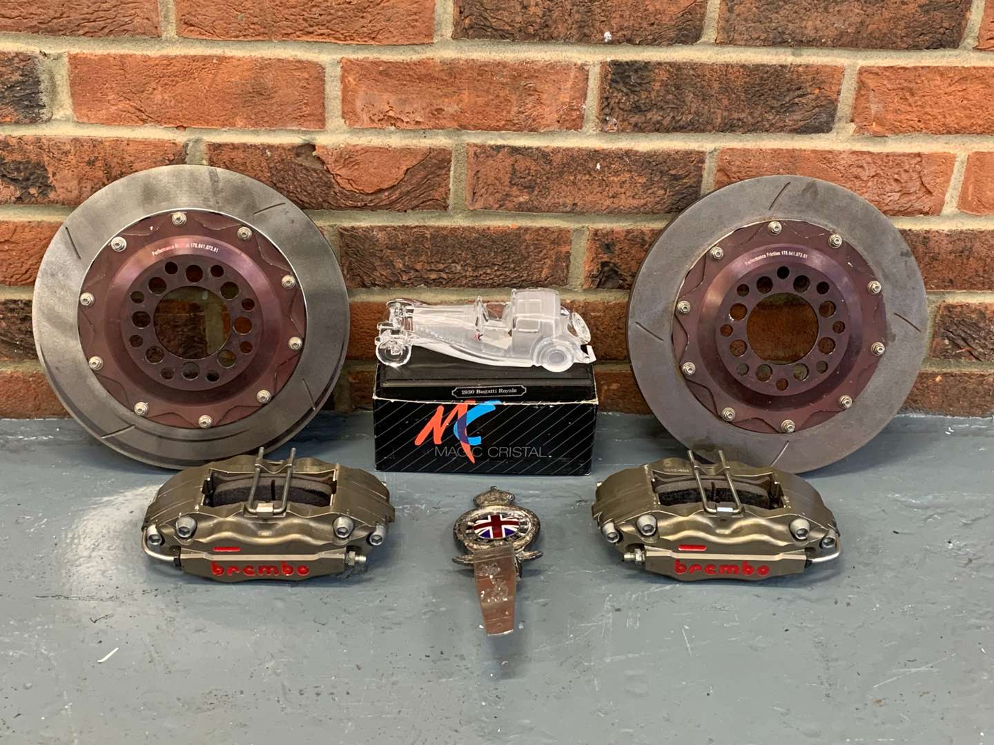 <p>Pair 270mm Vented Discs, Brembo Calipers and Pads 1920's Car Badge and Bugatti Paperweight</p>