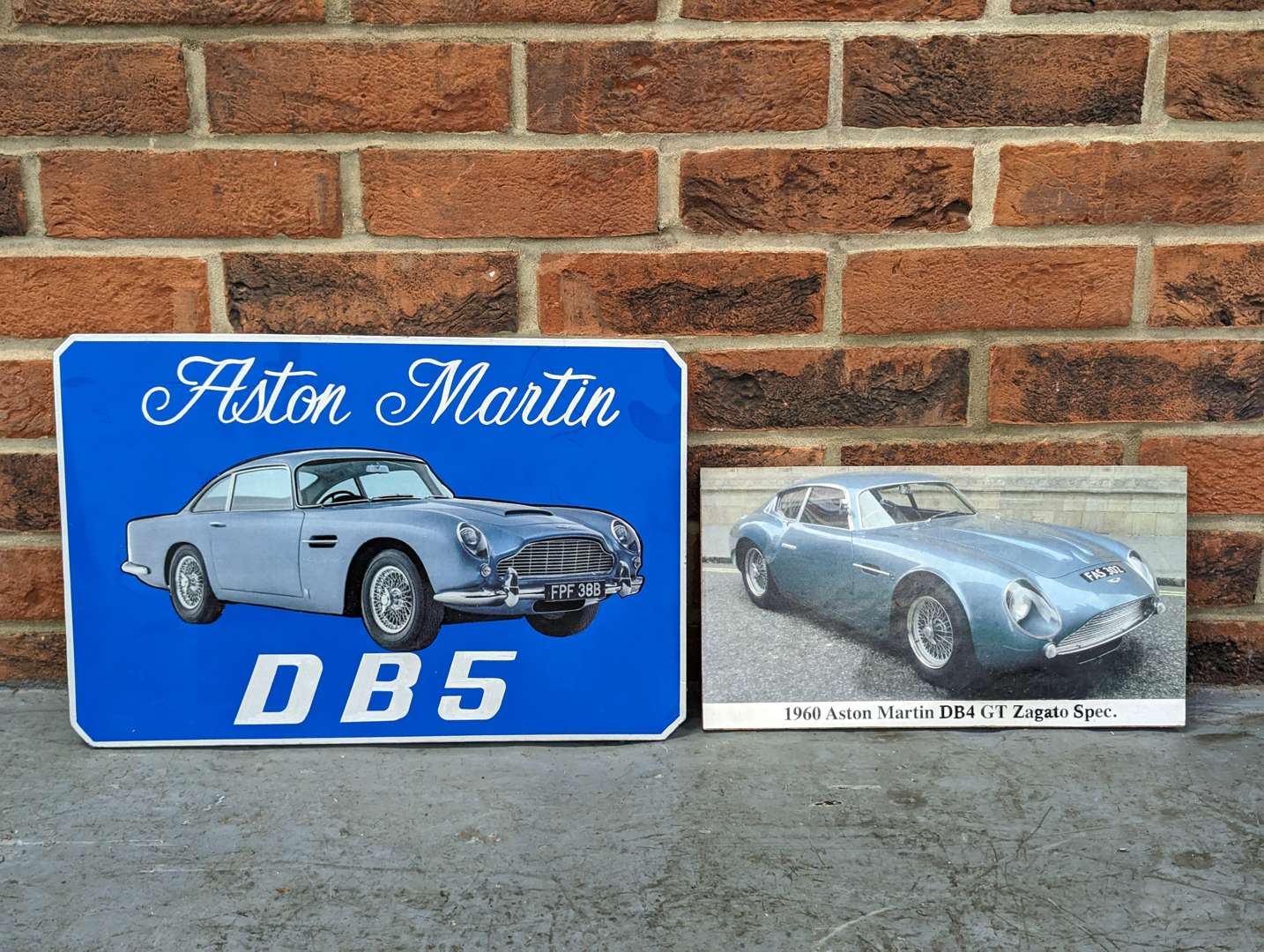 <p>Two Aston Martin Signs on Board</p>
