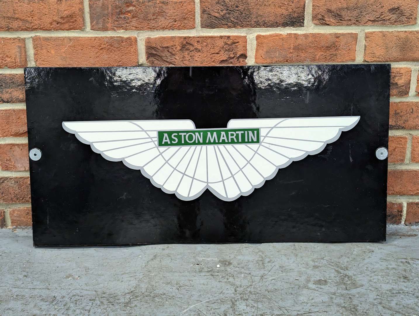 <p>Painted Wooden Aston Martin Sign</p>
