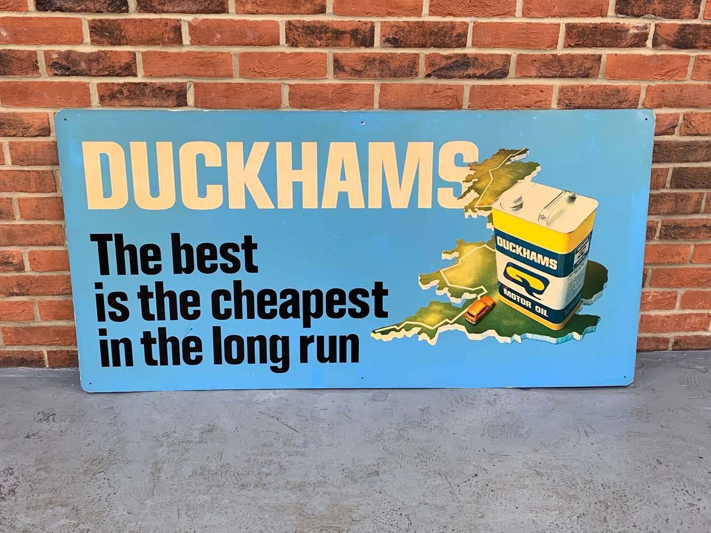 <p>&nbsp;An Original Large Aluminium Duckhams “The Best is The Cheapest in The Long Run" Sign</p>