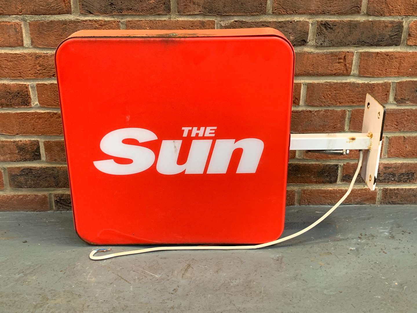 <p>Illuminated “The Sun” Advertising Sign</p>