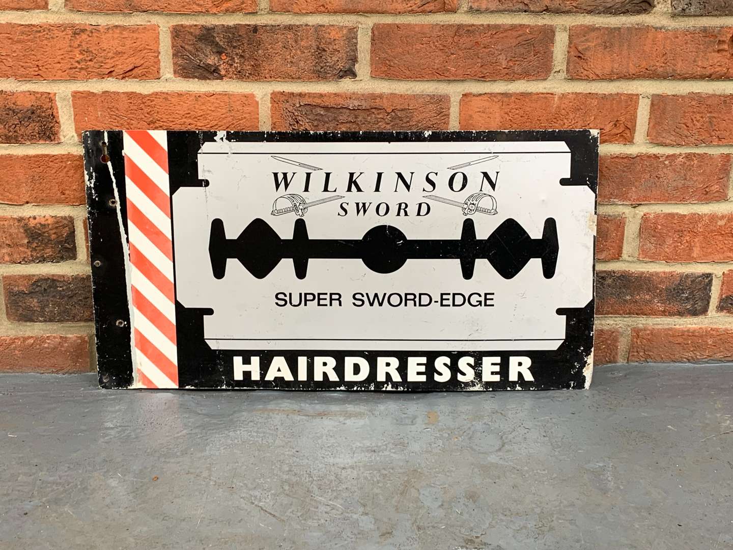 <p>Aluminium Wilkinson Sword Hairdresser Sign</p>