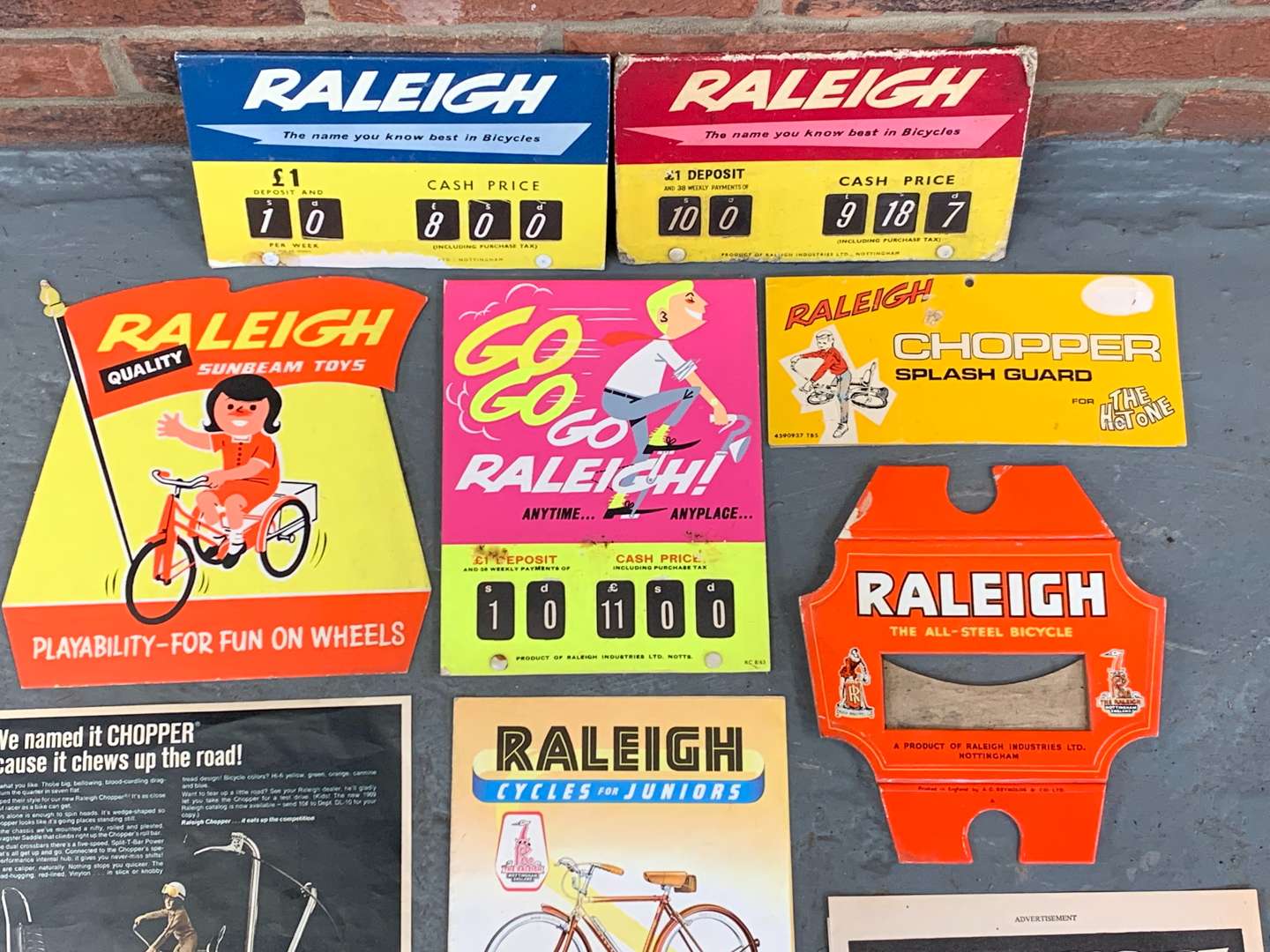 <p>Original Raleigh Bicycle Shop Point of Sale Advertising Signs</p>