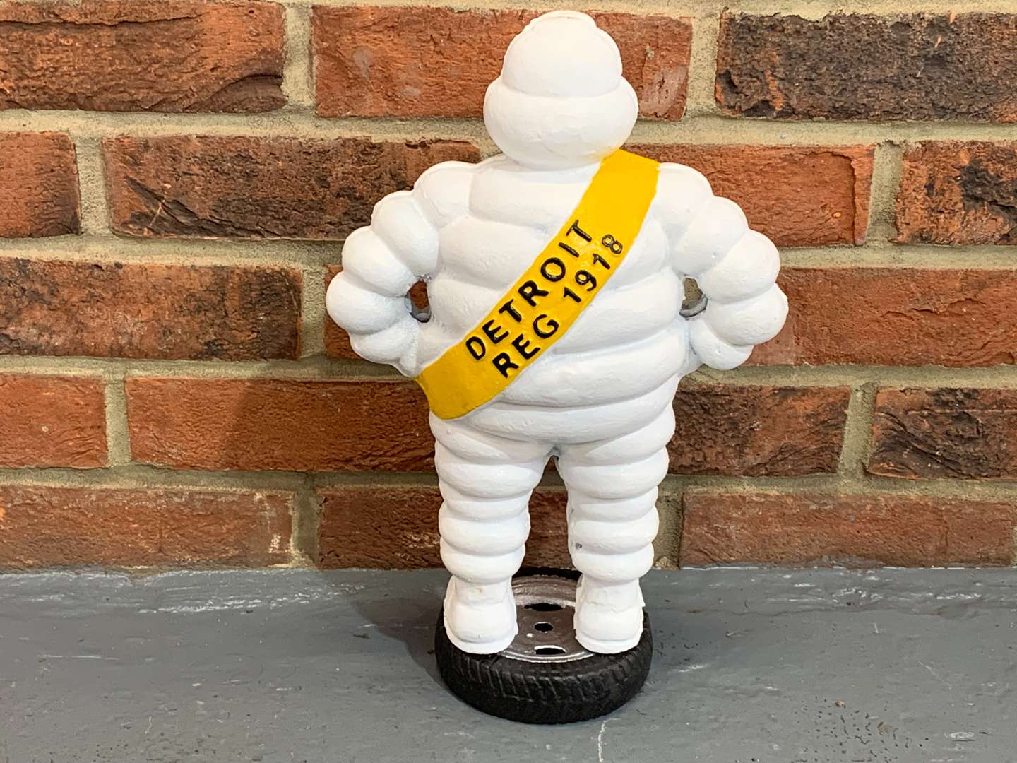 <p>Cast Iron Michelin Man Standing on a Tyre&nbsp;</p>