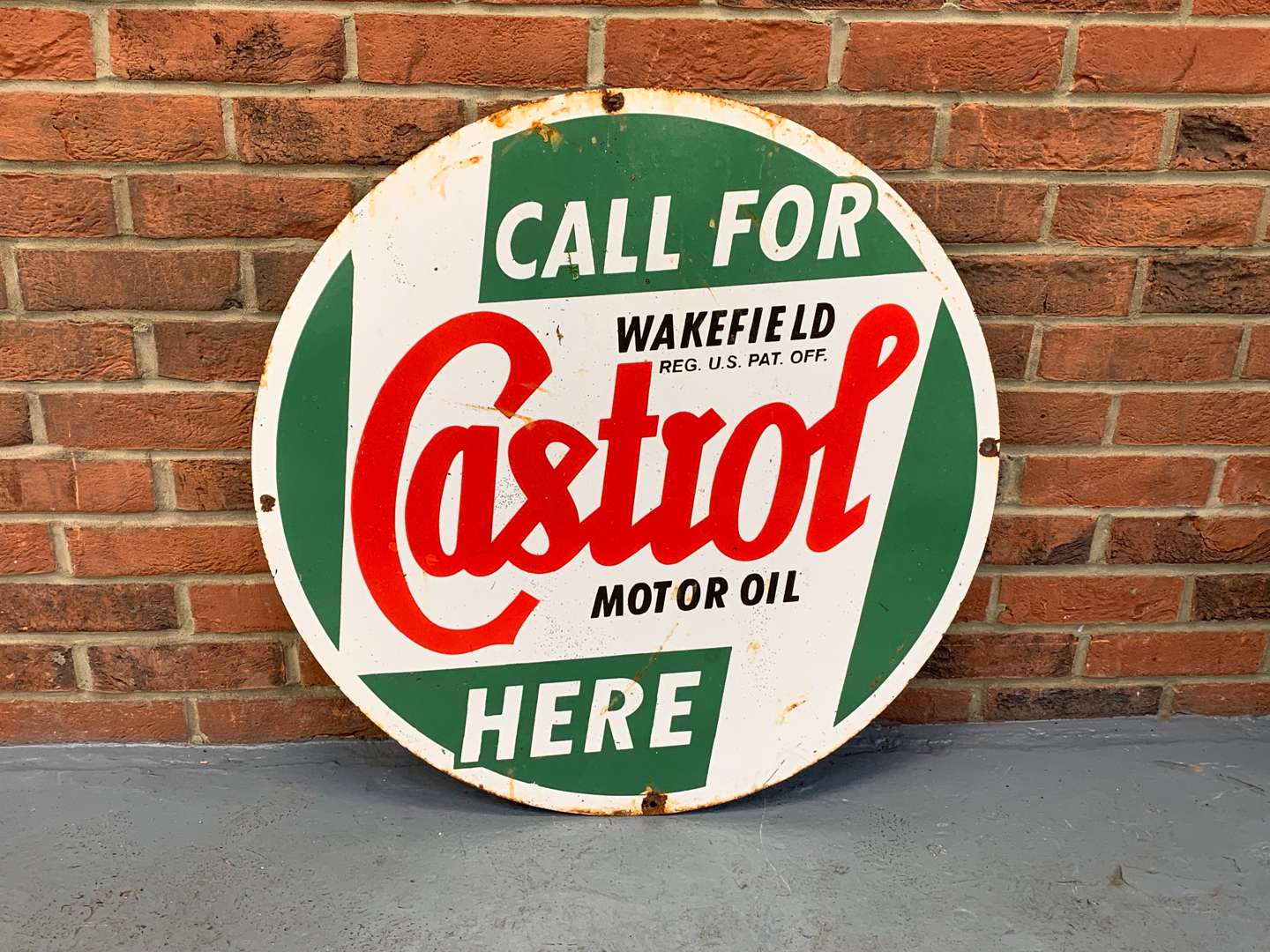 <p>Enamel Circular Call For Castrol Motor Oil Here</p>