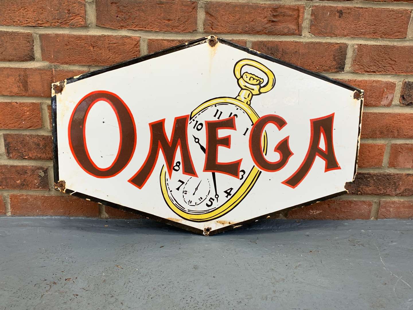 <p>Enamel Omega Watch Sign</p>