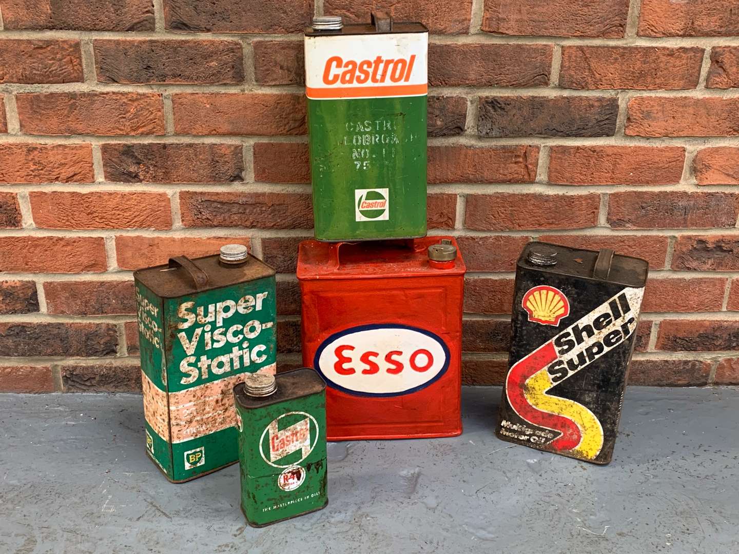 <p>Five Vintage Oil and Fuel Cans</p>